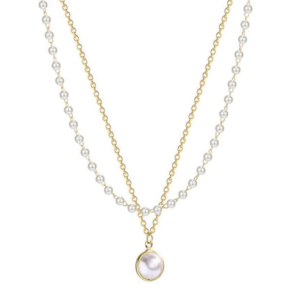 ZELTA TOŅA DUBULTĀ KAKLAROTA AR PĒRLĒM